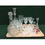 A tray of glass decanters, comports,