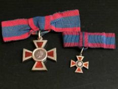 A Royal Red Cross medal with miniature,