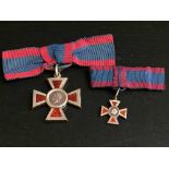 A Royal Red Cross medal with miniature,