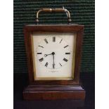 A French striking brass carriage clock, twin barrel movement with platform escapement,