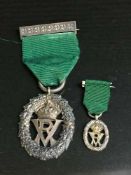 A silver Volunteer decoration with miniature,