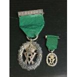 A silver Volunteer decoration with miniature,