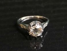An 18ct white gold diamond solitaire ring,