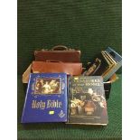 Three boxes of Holy Bible, LP records, small leather luggage case, brief case, china,