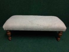 A pine legged duet footstool