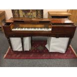 A 19th century inlaid mahogany table piano