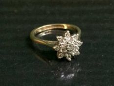 An 18ct gold and diamond set cluster ring