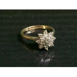 An 18ct gold and diamond set cluster ring