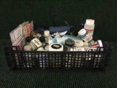 A crate containing a selection of handicraft items : Paints, solvents, heat torch, etc.