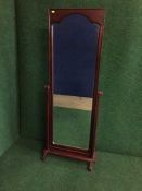 A mahogany framed cheval mirror