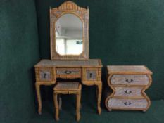 A bamboo and wicker dressing table with mirror and stool and a bedside chest