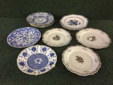 Seven 19th century Japanese tin glaze earthenware plates,