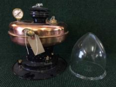 An antique copper hanging paraffin light fitting