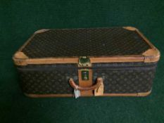A vintage Louis Vuitton suitcase