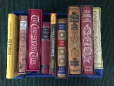 A crate of nine Folio Society volumes including Rob Roy by Walter Scott, The Canterbury Tales etc,