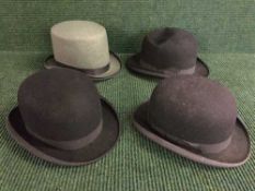 Three Gent's bowler hats together with one other