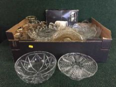 Three boxes of assorted glass ware, including decanters, fruit bowls, serving plates,