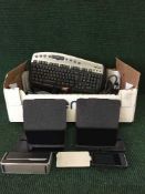 Box of Amazon fire tablet, wireless keyboards, digital camera,