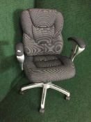 A swivel office armchair