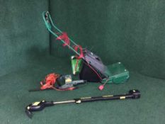 A qualcast electric lawnmower together with a Black and Decker hedge trimmer together with a G-Tech