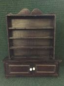 A early 20th century miniature oak dresser