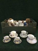 Four boxes of china, glass ware, collector's plates,