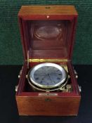 A Cased Chronometer 1515, the silvered dial signed John Fletcher, Maker to the Admiralty,