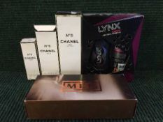 A crate of two bottles of Chanel eau du toilette, Chanel body Satin spray,