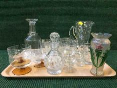 A tray containing glass water jug and beaker, cut glass decanter,
