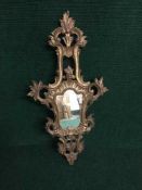 A Victorian gilt wooden decorative wall mirror