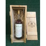 A bottle of The Macallan Anniversary Malt 25 Year Old Blended Scotch Whisky, distilled in 1962,