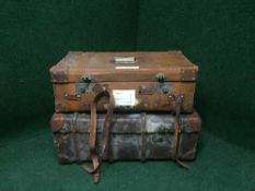 An early 20th century oak bound trunk and leather suitcase