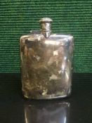 A sterling silver hip flask