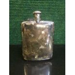 A sterling silver hip flask