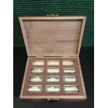 The Birmingham Mint, Royal Palaces, A collection of 12 sterling silver ingots,
