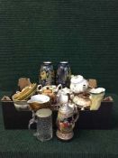 A box of assorted vases, teapots,