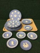 A tray of eighteen blue and white Jasper ware Wedgwood plates including ten Christmas anniversary