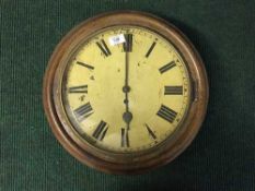 An early twentieth century mahogany school clock
