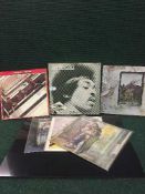 A collection of LP's and singles to include; Jimi Hendrix Anniversary Box Set, Jethro Tull,