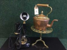 A reproduction candlestick telephone,