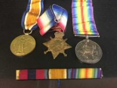 A box of a trio of WWI Durham Light Infantry medals with ribbons