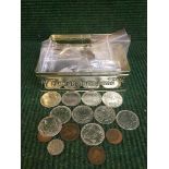 A tin of assorted British and European coins, fantasy coins,