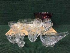 A tray of lead crystal brandy glasses, water jug, glass swan ornament, glass desert dishes etc.