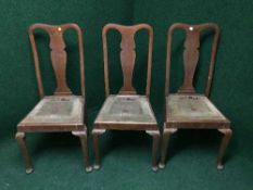 Three oak Queen Ann style chairs