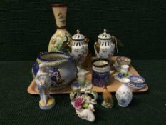 A pair of Meissen style gilded lidded urns, pottery jug, Royal Staffordshire candle holders,