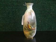 A Royal Worcester vase hand painted with panel depicting pheasant and chick, numbered 2491,