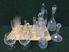 A tray of lead crystal decanters, brandy glasses etc.