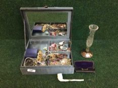 A box of costume jewellery, clay pipe,