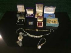 A box of costume jewellery, dress ring, three wrist watches, silver filigree etc.
