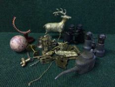 A tray of field glasses, assorted brass including ornaments, gavel, bottle openers,